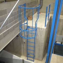 Painted cage ladder for a mezzanine Polyester powder coated cage ladder for mezzanine access