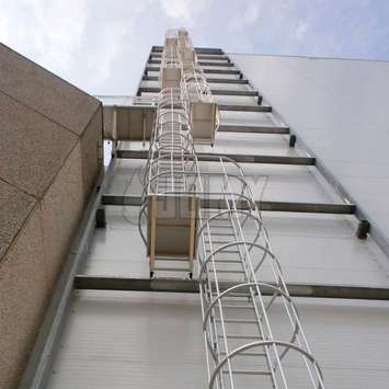 Cage ladder: industrial quality permanent egress and access solution.