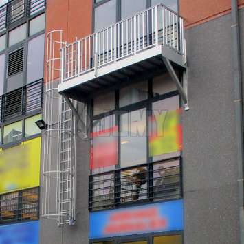 Cage ladder and balcony for safety evacuation of office building.