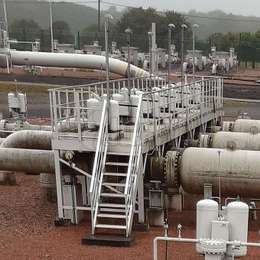 Exterior industrial stairs and walkway platform on a gas distribution plant (GDP).