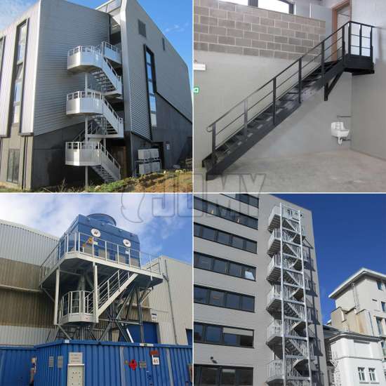Aluminium stairs made for egress and access and placed outside of a medium sized building.
