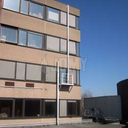 3 story alternating retractable ladders for the evacuation of an office building.