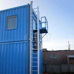 Construction container equiped with a JOMY Retractable Ladder for emergency evacuation.