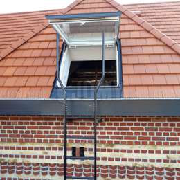 Fire escape ladder without cage for a skylight window, painted and used to get down to the adjencent flat roof.