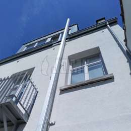 Retractable fire escape ladder for the windows of a roof apartment.