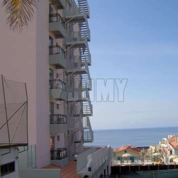 Fire escape stairs along the sea