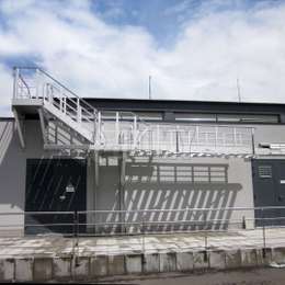 Industrial counterbalanced staircase for fire escape.