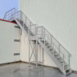 Crossover stairs and bridge on the roof of a warehouse building