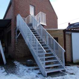 2 storey home exterior access stairs.