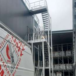 Roof access and evacuation staircase for an industrial building.