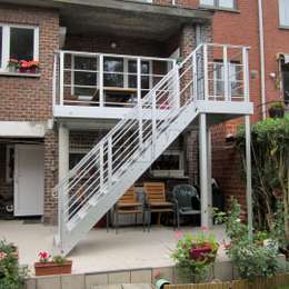 Metal balcony and stairs in aluminium Custom-made metal balcony and access stairs