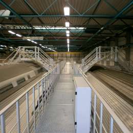 Aluminium crossover stairs for accessing working platforms on both sides of the train carriages.