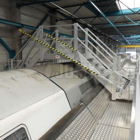 Mobile crossover stairs used for the maintenance of trains.