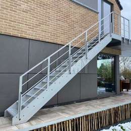 Outside stairs with landing for a home Straight stairs and landing to access the first floor of a home
