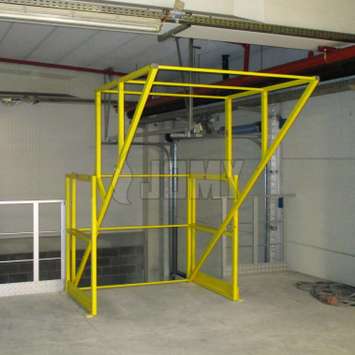 Pallet roll-over gate for truck loading.