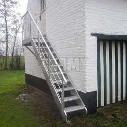 Residential stairs outside of a house Residential stairs to access the first floor of a country house
