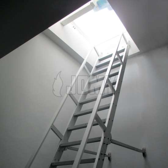 Counterblanced aluminium ship ladder used to access an industrial mezzanine.