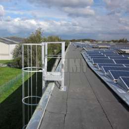 Roof ladder with cage used for solar panel access and maintenance.