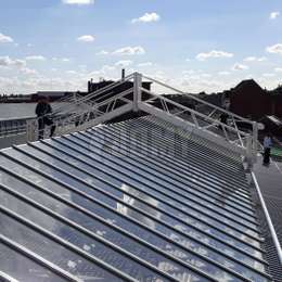 Traveling crossover stairs and platform for window cleaning.