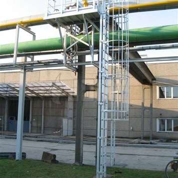 Valve access by aluminum ladder Valve access by aluminum ladder