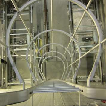 JOMY Caged aluminum ladders are fixed ladder forseen of safety hoops as prescribed by regulators. Our safety cage is also made in anodised aluminum and has a very clean and straight look beside of being strong and thrustworthy. This is the ideal fire ladd JOMY fire escape ladder. The most economic ladder is the fixed ladder with safety hoops according to regulations. For more then 40 years JOMY makes those ladders and adapts them to each specific situation.